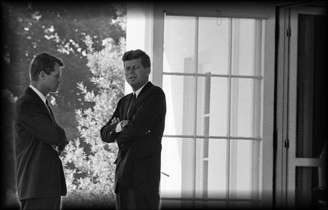 President John F. Kennedy confers with his brother Attorney General Robert F. Kennedy (Oct.01,1962) [www.wbur.org]